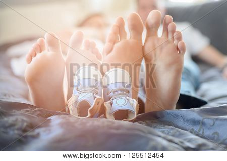 Pregnant Mother And Future Dad Feet