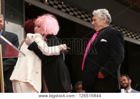LOS ANGELES - APR 11:  Sharon Osbourne, Cyndi Lauper, Harvey Fierstein at the Harvey Fierstein and Cyndi Lauper Hollywood WOF Ceremony at the Pantages Theater on April 11, 2016 in Los Angeles, CA
