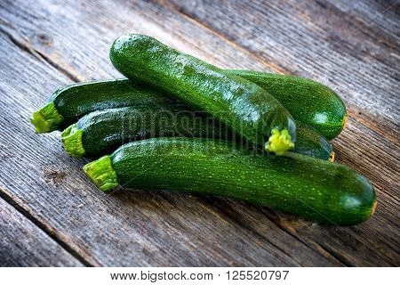 Fresh Zucchini On Wooden Background