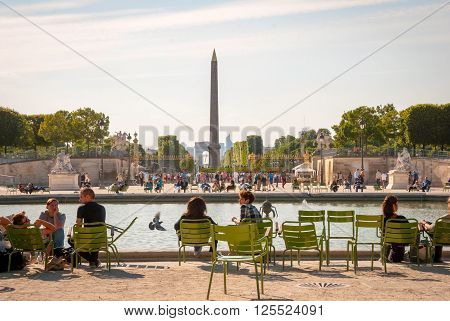 People Relaxing In Garden Of Tuileries