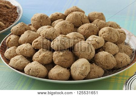 Dish with Moroccan festive homemade ghoriba cookies  