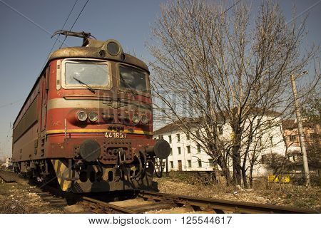 Locomotive waiting to be hooked his train track