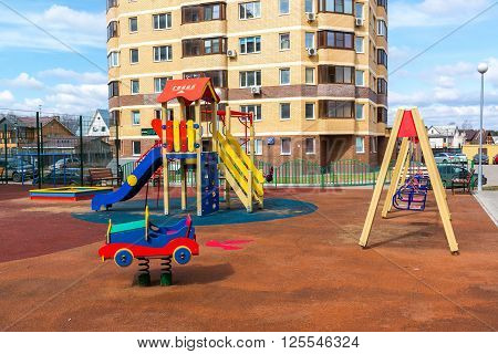 Andreevka, Russia - April 11.2016. playground in the residential complex Uyutniy