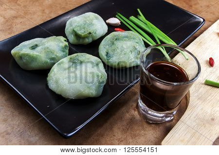 Allium tuberosum. Garlic chives with soy source. Dim sum is chinese cuisine.