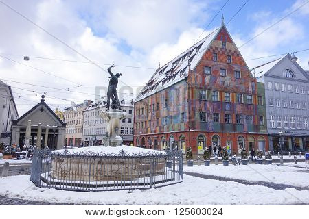 Augsburg Germany - January 17 2016: Old town street in city of Augsburg during winter time. Augsburg is Germany's third oldest city.