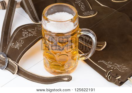 traditional Bavarian pants deerskin and a mug of beer