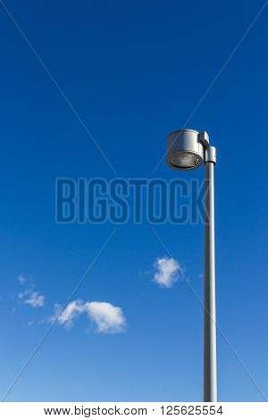 Street light against a blue sky background