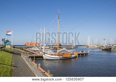 HINDELOOPEN, NETHERLANDS - APRIL 11, 2016: Harbor in the historical city Hindeloopen, Netherlands
