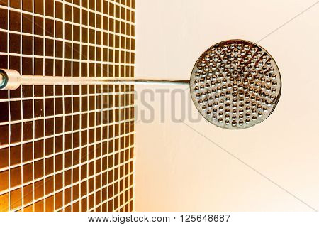 Stainless steel shower in a low angle