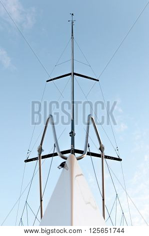 Yacht from the bottom view with tall antenna on the top
** Note: Shallow depth of field