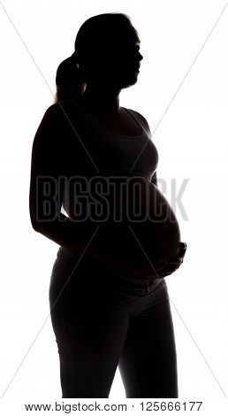 Silhouette of expactant mother on white background