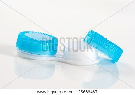 Blue contacts case on the white background