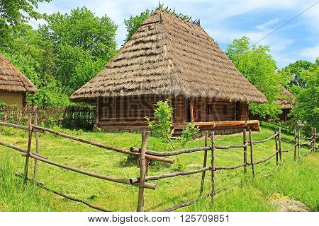 Old wooden house in museum of Folk Architecture in Uzhhorod, Ukraine