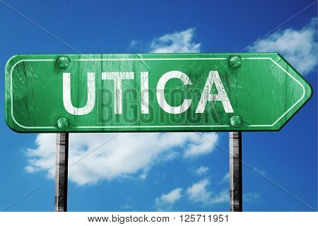 utica road sign on a blue sky background
