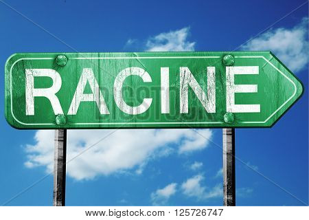 racine road sign on a blue sky background