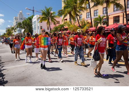MIAMI BEACH, FLORIDA, APR 2016: The 8th Annual Miami Beach Gay Pride Parade, along Ocean Drive in Miami Beach, Florida. Lesbian, gay, bi, and transgender celebrate diversity. Editorial image only.