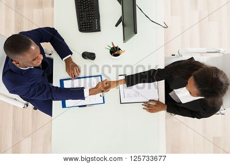 Two Businesspeople Shaking Hand