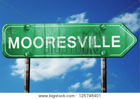 mooresville road sign on a blue sky background