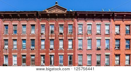 Brooklyn New York - August 29 2014: Front of residential brick house at Manhattan Ave in Greenpoint.