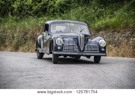 PESARO, ITALY - MAY 15: ALFA ROMEO 6C 2500 Freccia Oro 1948 on an old racing car in rally Mille Miglia 2015 the famous italian historical race (1927-1957) on May 2015