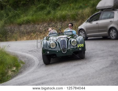 PESARO, ITALY - MAY 15: JAGUAR XK 120 OTS Sports 1950 on an old racing car in rally Mille Miglia 2015 the famous italian historical race (1927-1957) on May 15 2015