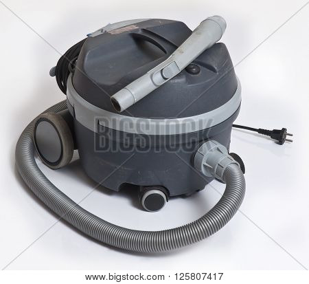 gray vacuum cleaner over isolated white background