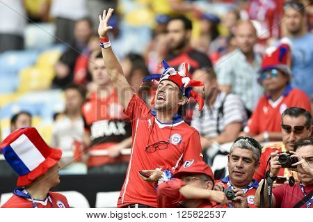 RIO DE JANEIRO BRAZIL - June 18 2014: Fan with happy face during the FIFA 2014 World Cup. Spain is facing Chile in the Group B at Maracana Stadium