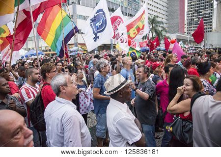 Rio de Janeiro Brasil - March 31 2016: Party workers and social movements are protests in defense of democracy and against the impeachment of President Dilma in the city center in Largo da Carioca