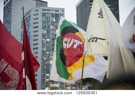 Rio de Janeiro Brasil - March 31 2016: Party workers and social movements are protests in defense of democracy and against the impeachment of President Dilma in the city center in Largo da Carioca