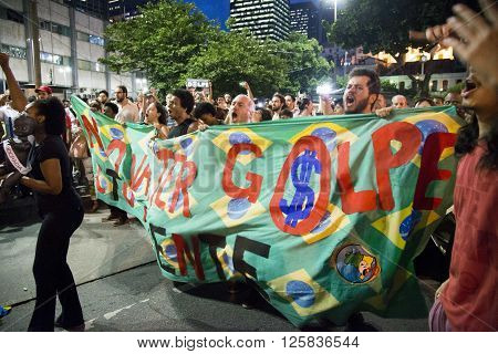 Rio de Janeiro Brasil - March 31 2016: Party workers and social movements are protests in defense of democracy and against the impeachment of President Dilma in the city center in Largo da Carioca
