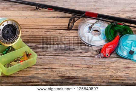 Fishing Tackles On Background Of Dry Stems