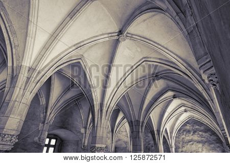 HUNEDOARA, ROMANIA - AUGUST 13, 2015: gothic vaults Knight's Hall of Corvin Castle in Hunedoara, Romania 
