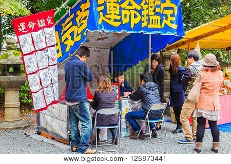 KYOTO JAPAN - NOVEMBER 23 2015: Fotune Teller at  Fushimi Inari-taisha Shrine