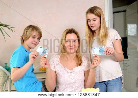 Mother Giving Her Children Pocket Money