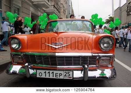 Rare old car in perfect condition on festive day