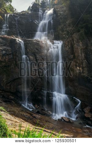 Beautiful waterfall.  Ramboda Falls waterfall in Sri Lanka. Falls - one of the symbols in Sri Lanka