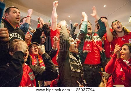 LIVERPOOL, UK - MAY 11th 2014: Liverpool Football Club supporters outside Anfield for the final title race match of the season against Newcastle