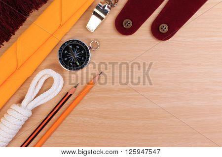 Orderliness White Scout Rope, Scarf, Whistle, Pencil, Compass And Blank Shoulder Epaulette On Wooden