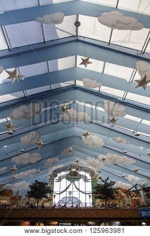 MUNICH, GERMANY - OCTOBER 02, 2015: Inside the Hacker Festzelt (Himmel der Bayern) at Oktoberfest with its lovely decoration of the roof and the surrounding walls