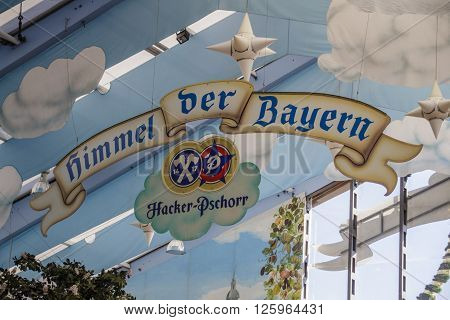 MUNICH, GERMANY - OCTOBER 02: Inside the Hacker Festzelt (Himmel der Bayern) on Theresienwiese at Oktoberfest with its lovely decoration of the roof and the surrounding walls