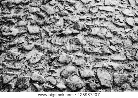 Surface of the old paving stone street