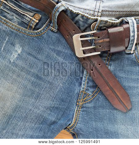 blue jeans with brown leather belt, clothing industry