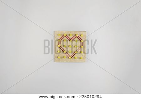 the heart symbol is modeled on the Board with spikes rubber bands stationery