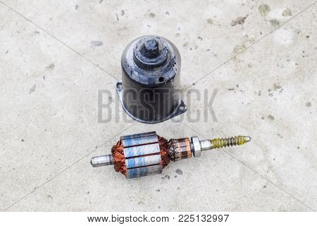 Electric wiper motor for car wipers. Disassembled electric motor.