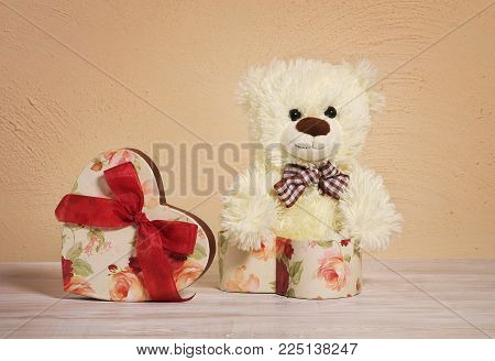 Teddy Bear & Heart Box. Valentines Day Background. Wooden Table