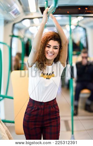 Smiling Arab Girl In Casual Clothes In The Street.