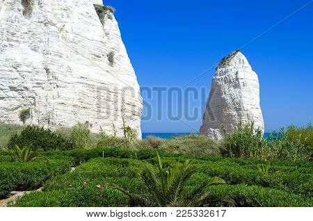 Vieste, Italy, view of the Pizzomunno monolith on the beach of the village