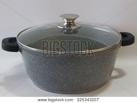 grey silver pan for cooking at the kittchen