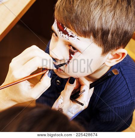 Little Cute Child Making Facepaint On Birthday Party, Zombie Apocalypse Facepainting, Halloween Prep