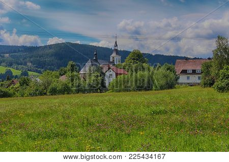 A Partially Renovated Church In A Small Mountain Village.